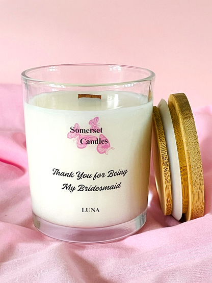 Scented Candle with 'Somerset Candles' branding on a pink background