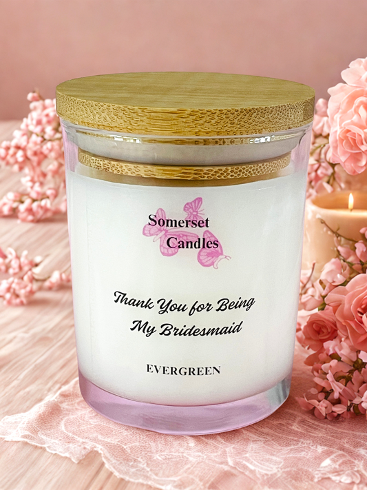 Somerset Candles 'Thank You for Being My Bridesmaid' candle with pink flowers on a pink background