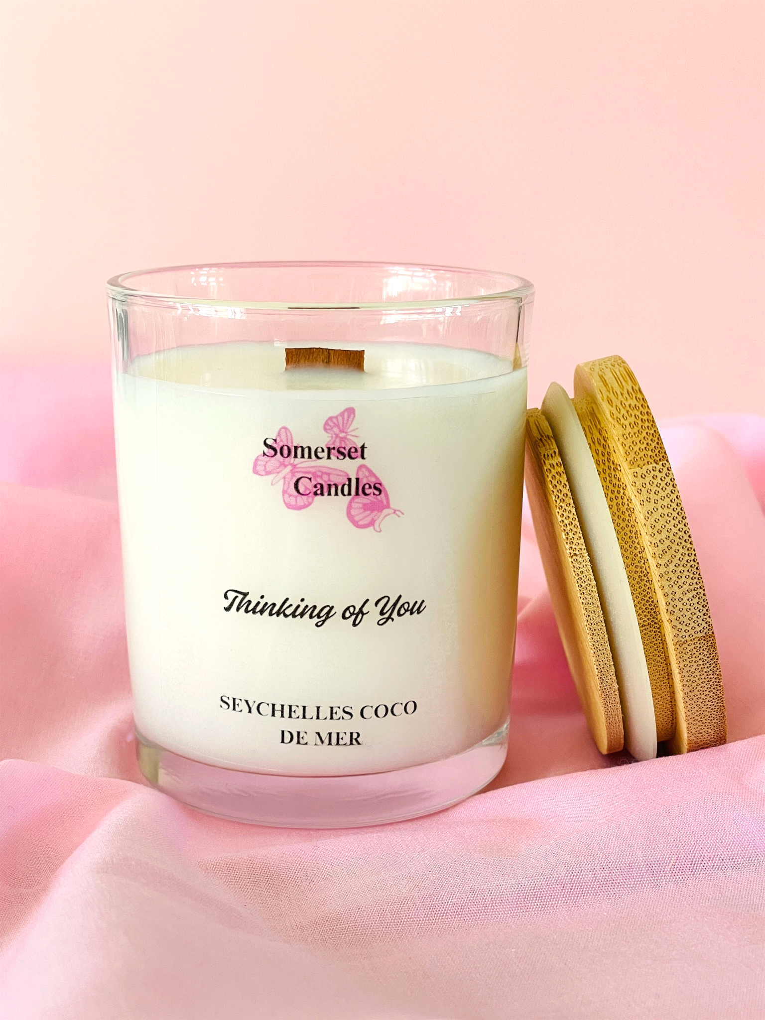 Somerset Candles 'Thinking of You' candle on a pink background