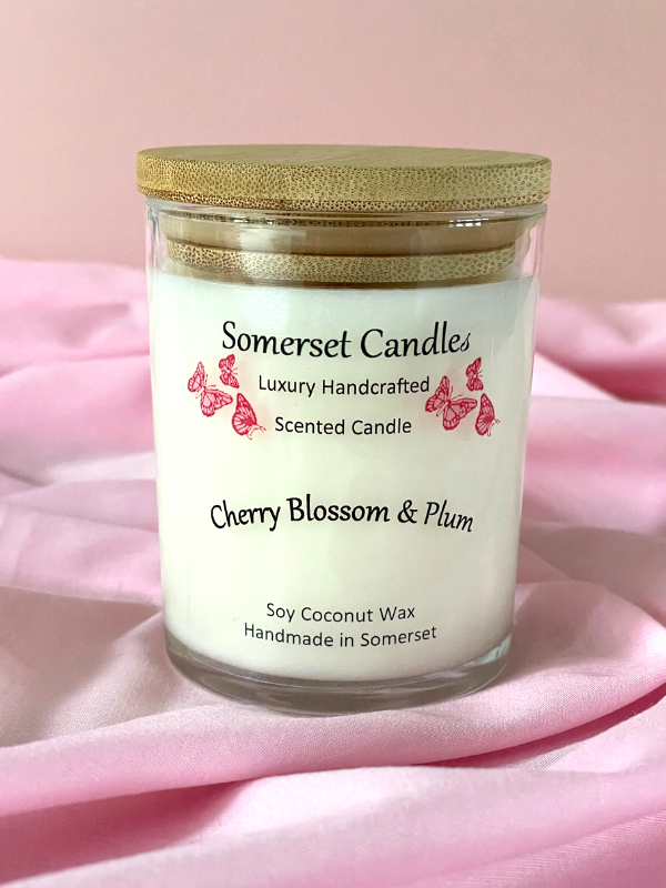 Somerset Candles cherry blossom & plum scented candle on a pink background