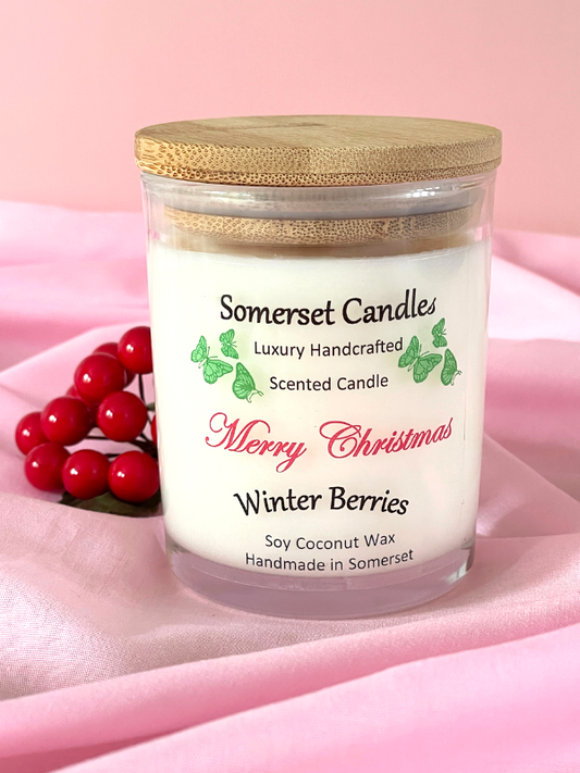 Somerset Candles winter berries scented candle on a pink background