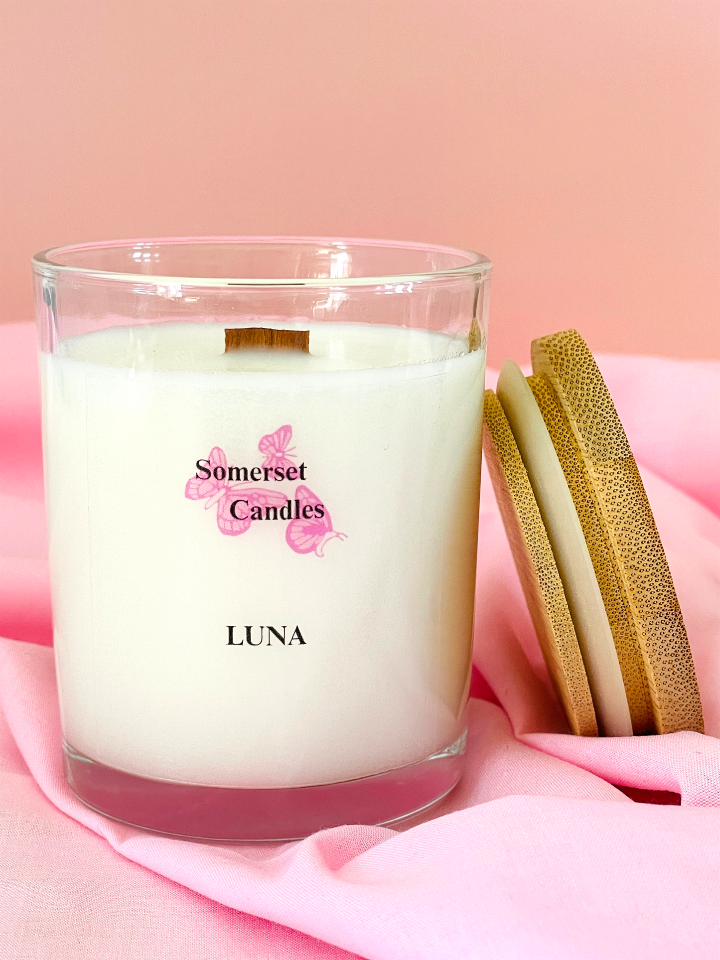 Somerset Candles Luna candle on a pink fabric background