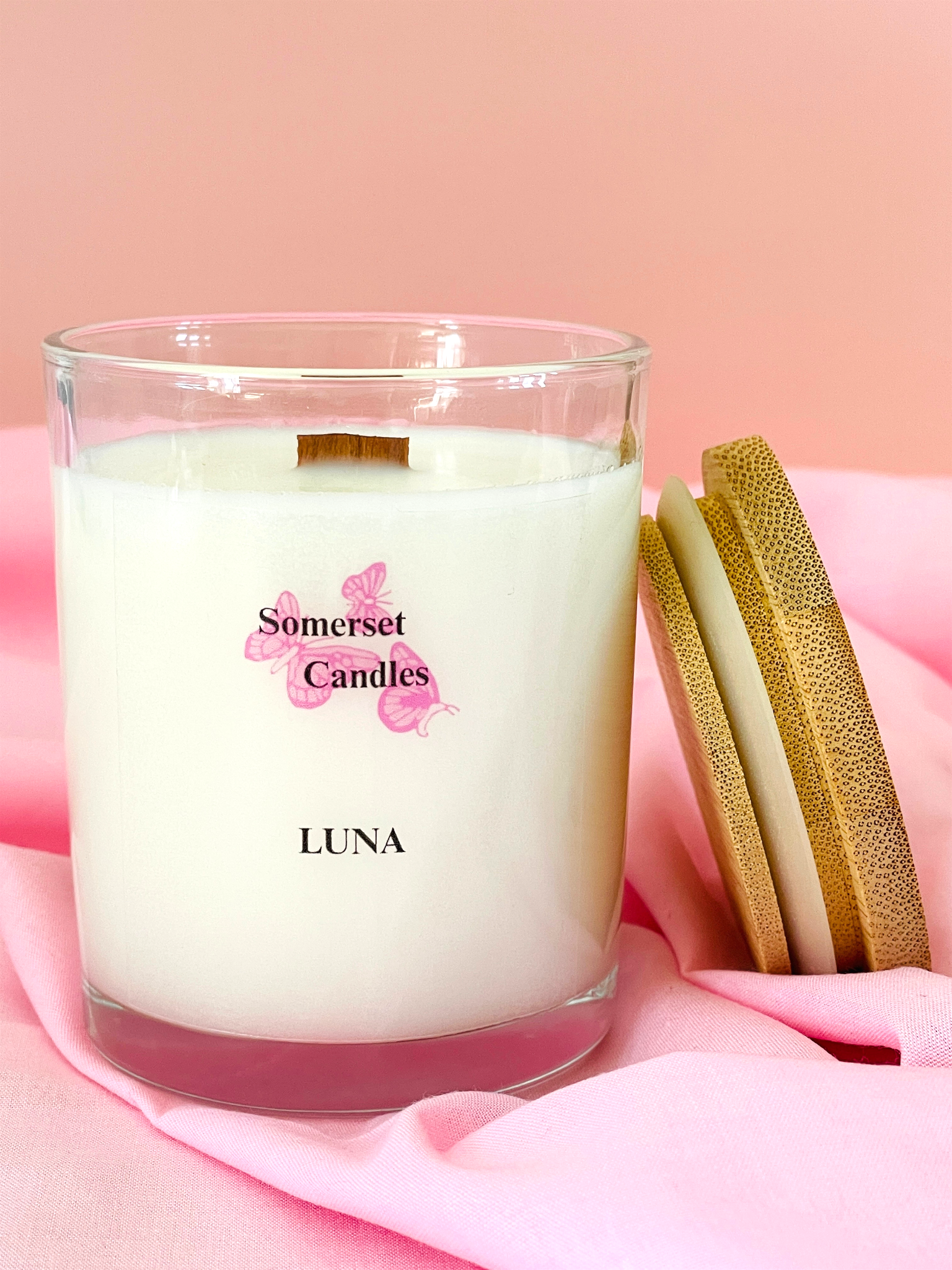 Somerset Candles Luna candle on a pink fabric background