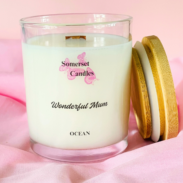 Somerset Candles 'Wonderful Mum' candle with wooden lid on a pink background