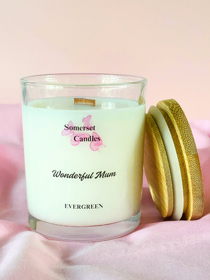 Somerset Candles 'Wonderful Mum' candle with wooden lid on a pink background