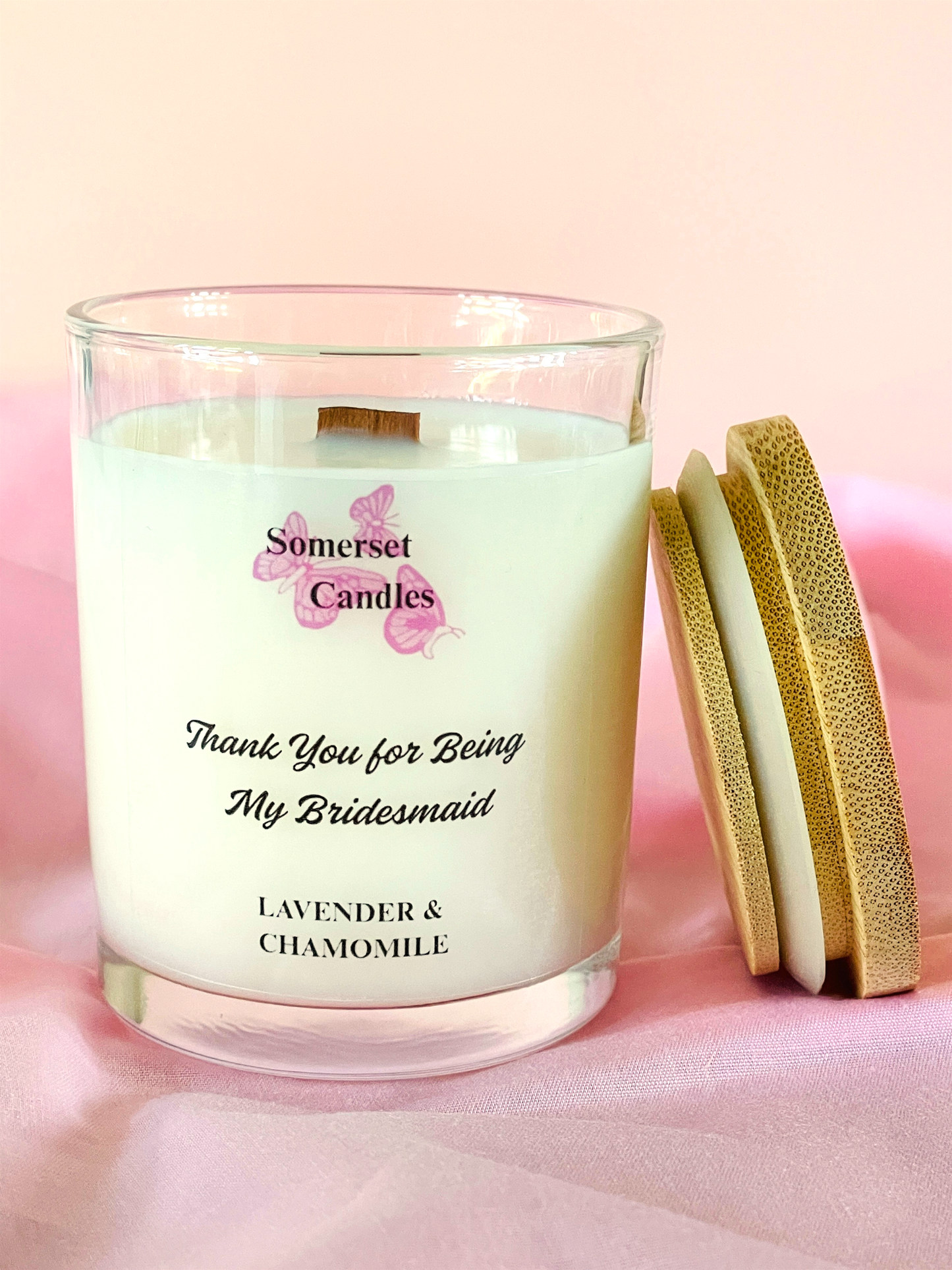 Somerset Candles lavender and chamomile candle with a pink background