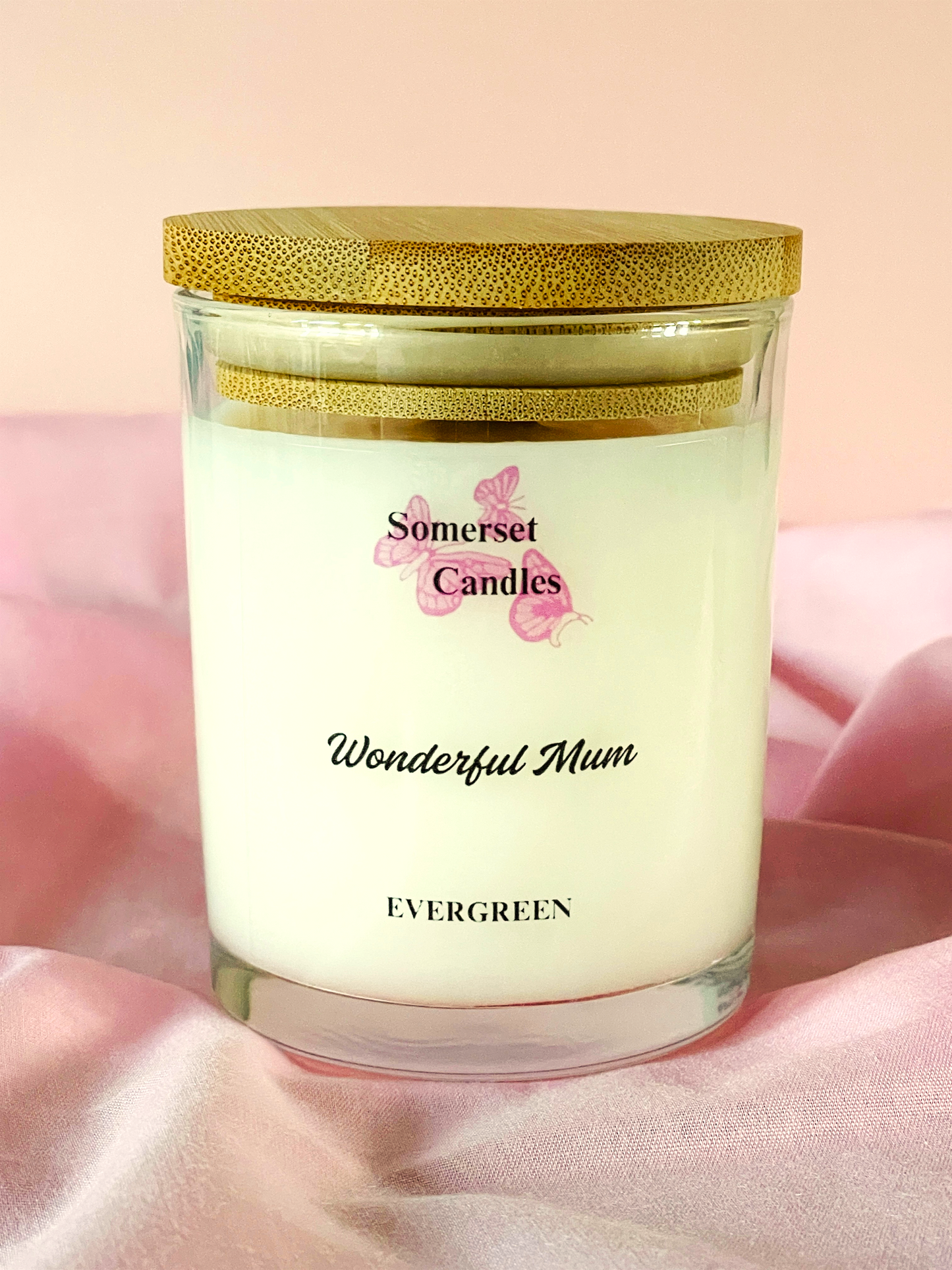Somerset Candles 'Wonderful Mum' candle with wooden lid on a pink background