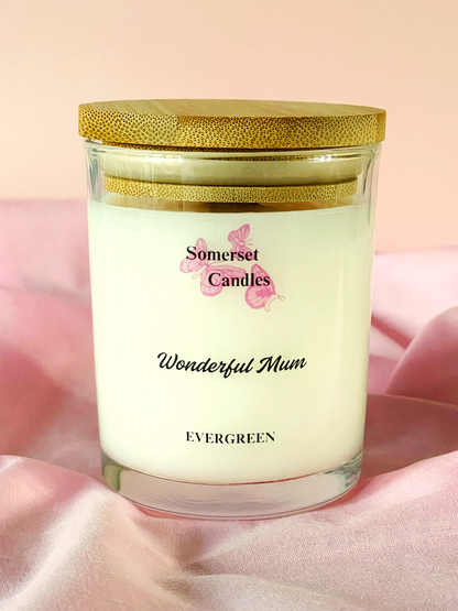 Somerset Candles 'Wonderful Mum' candle with wooden lid on a pink background
