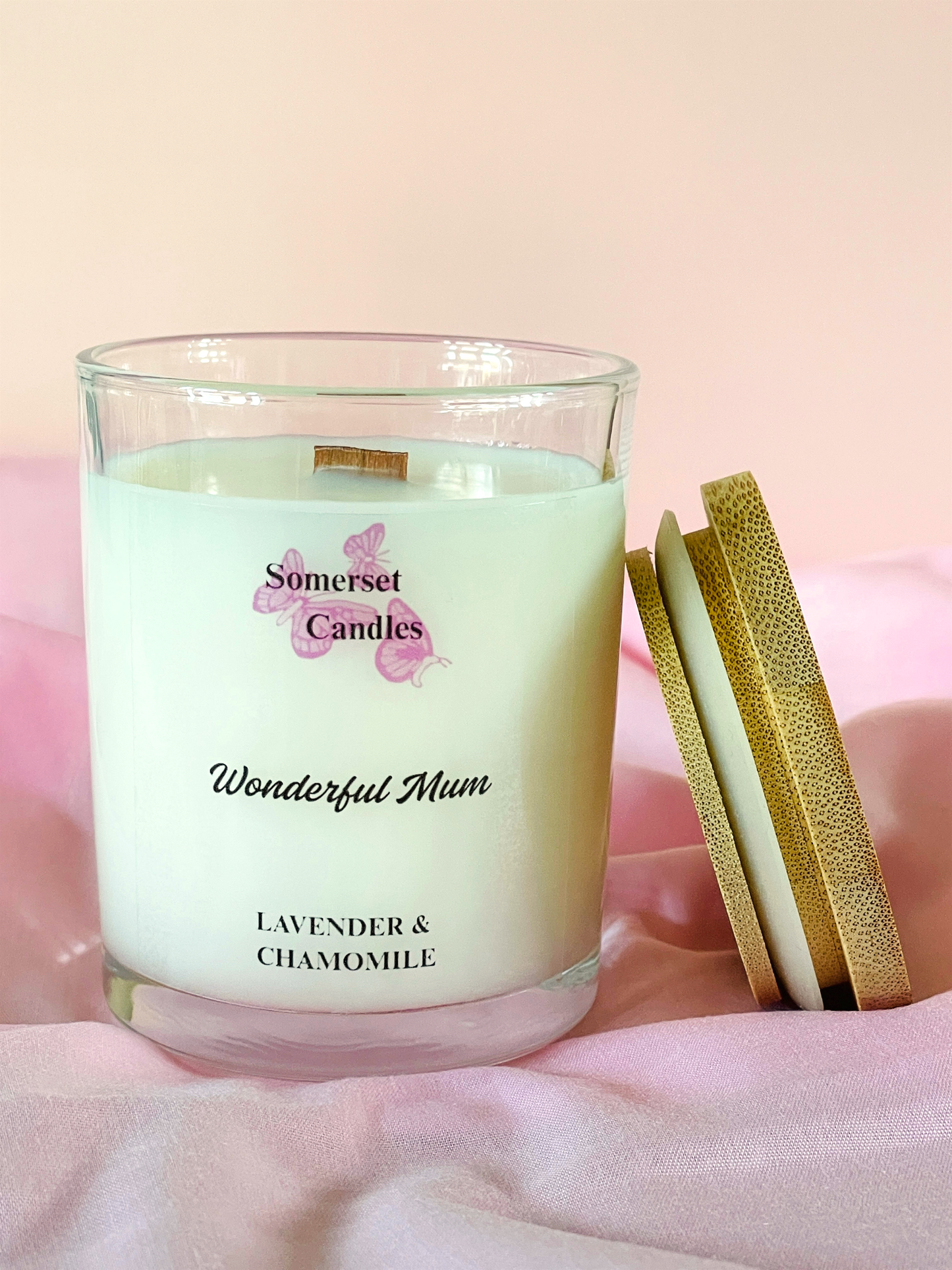 Somerset Candles 'Wonderful Mum' lavender and chamomile candle on a pink background