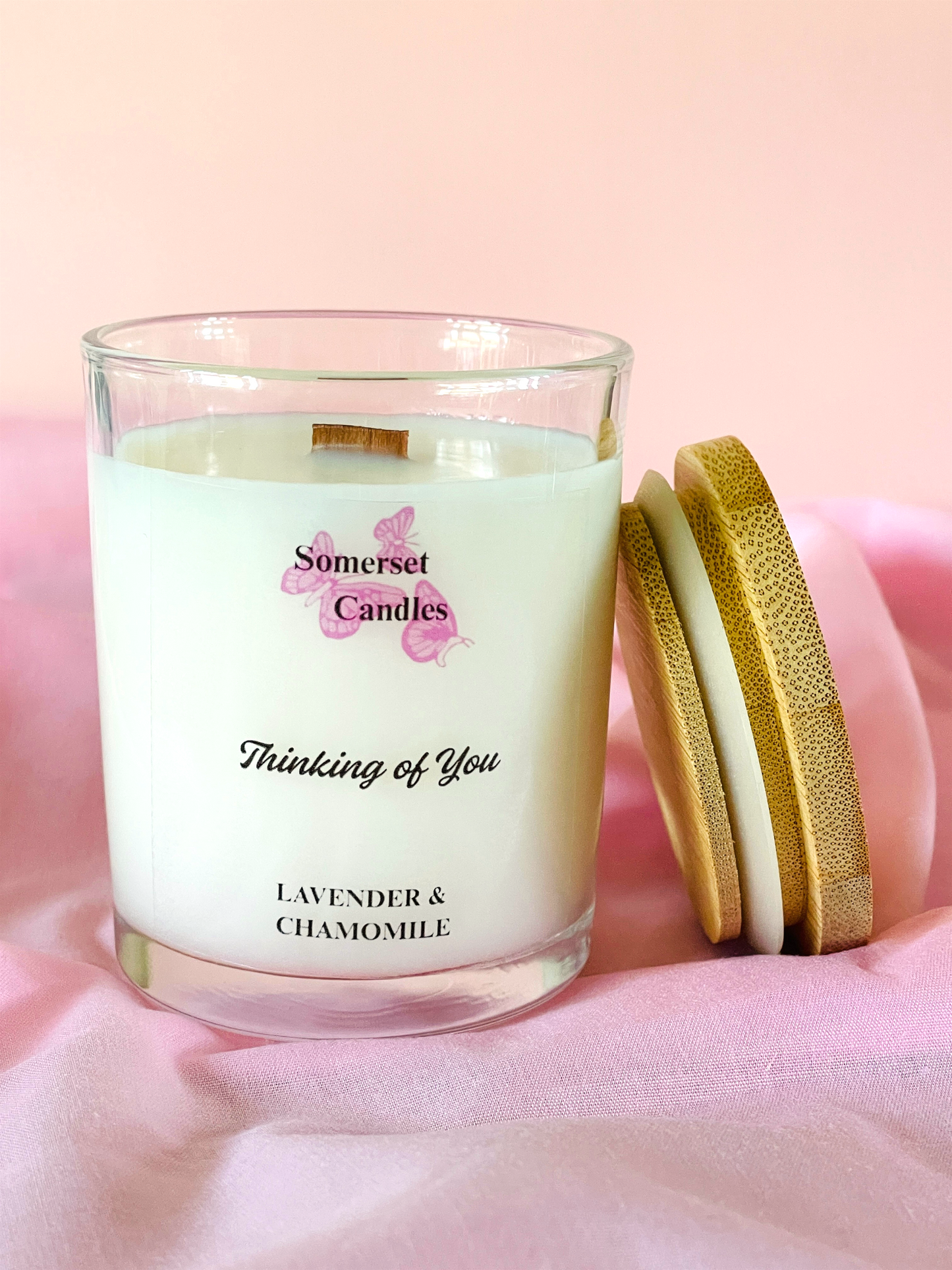 Somerset Candles 'Thinking of You' lavender and chamomile candle on a pink background