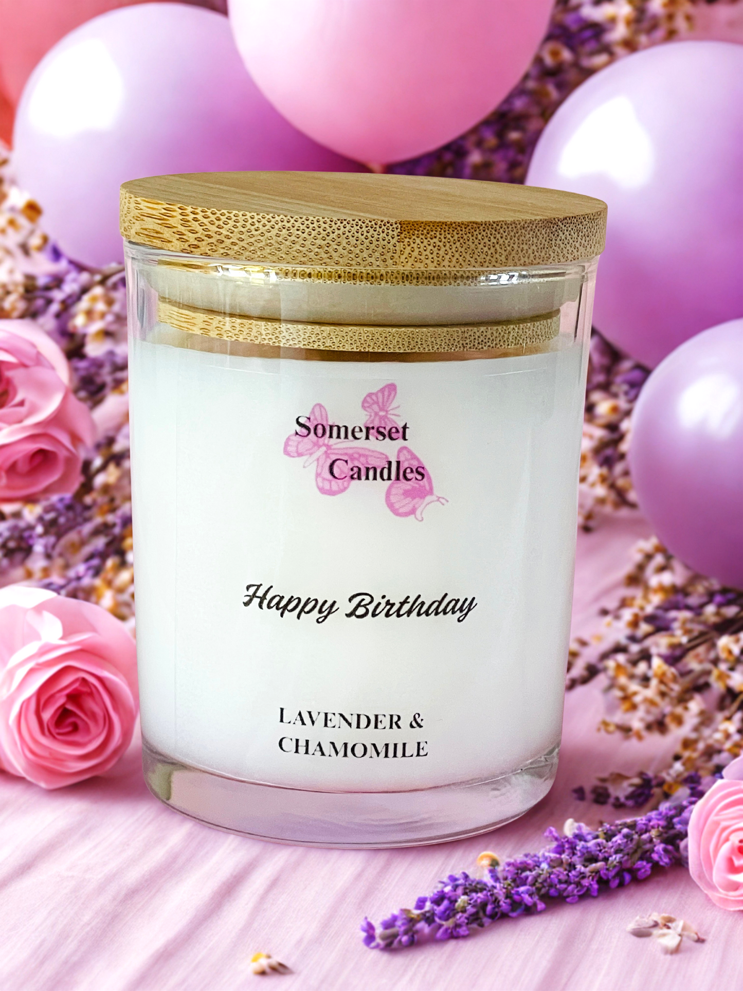 Somerset Candles 'Happy Birthday' lavender and chamomile candle with balloons and flowers in the background