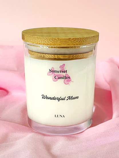 Somerset Candles 'Wonderful Mum' candle with wooden lid on a pink background