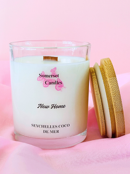 Somerset Candles New Home Seychelles Coco de Mer candle on a pink background