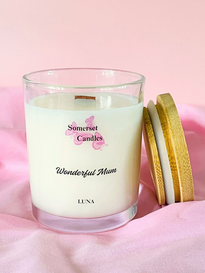 Somerset Candles 'Wonderful Mum' candle with wooden lid on a pink background