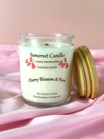 Somerset Candles cherry blossom & plum scented candle with a pink background