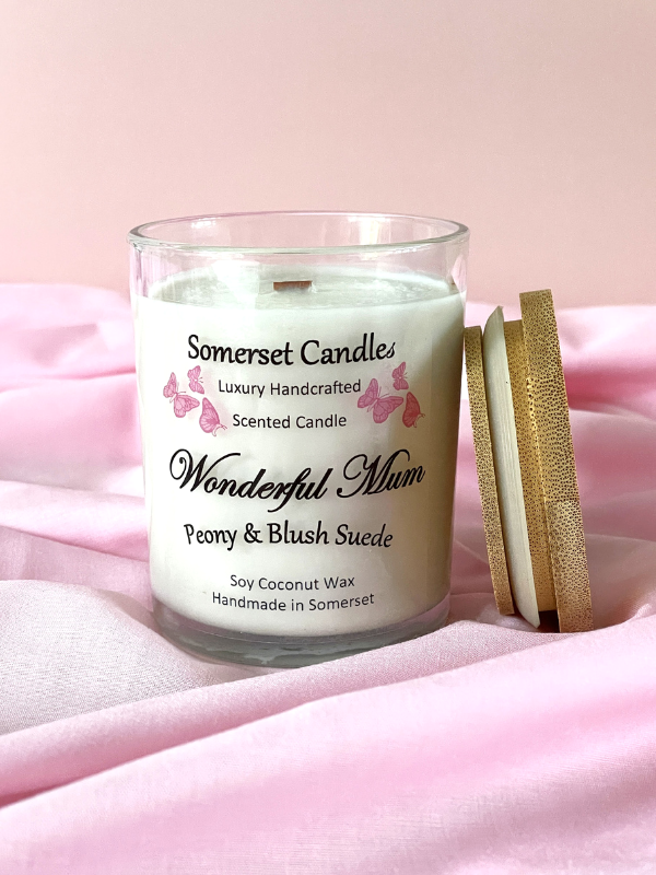Somerset Candles 'Wonderful Mum' candle on a pink fabric background