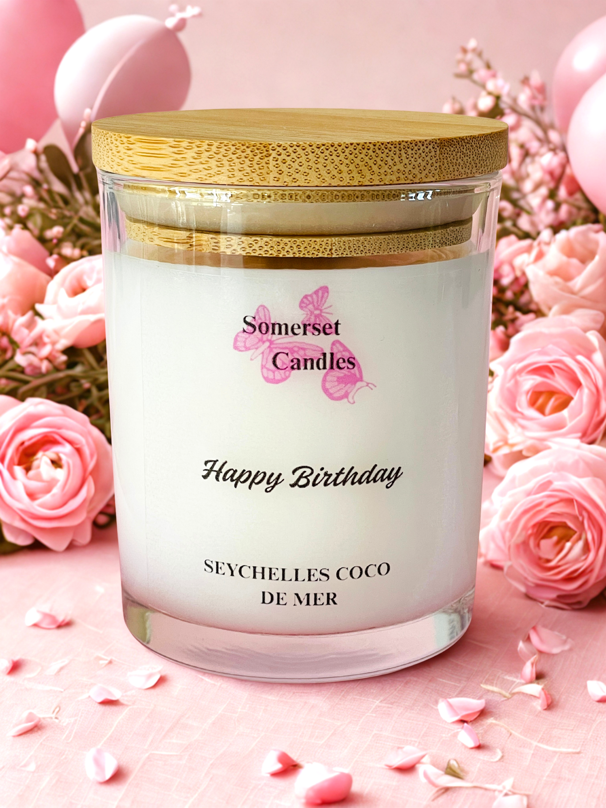 Somerset Candles birthday candle with pink roses and balloons in the background