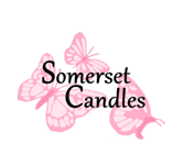 Somerset Candles logo featuring pink butterfly illustrations on a white background.
