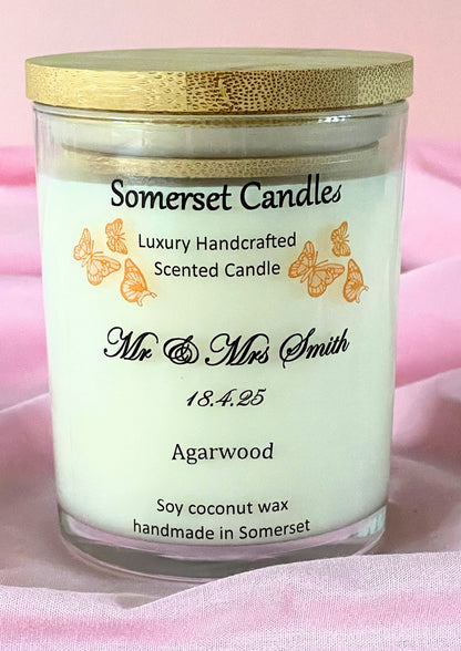 Somerset Candles scented candle with gold lid on a pink background