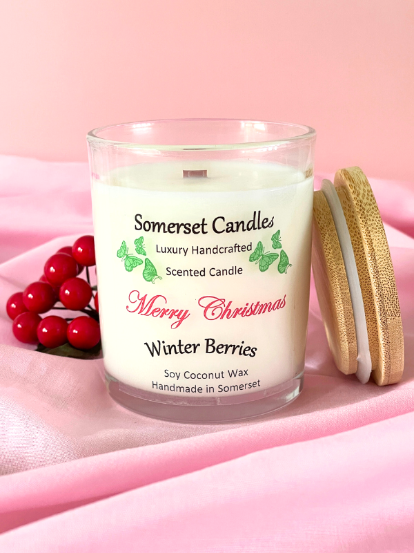 Somerset Candles winter berries scented candle on a pink background
