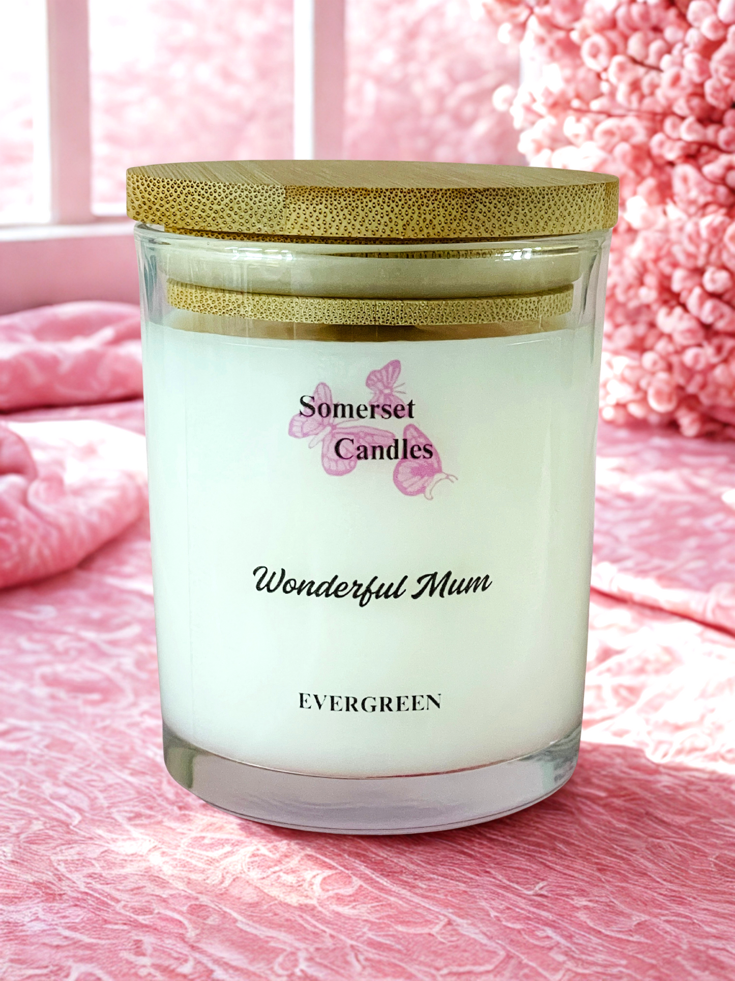 Somerset Candles 'Wonderful Mum' candle on a pink textured surface