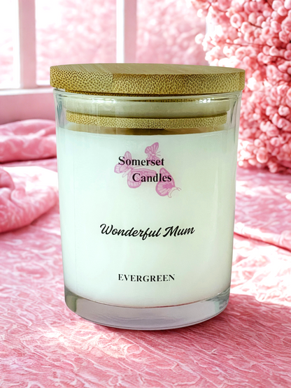 Somerset Candles 'Wonderful Mum' candle on a pink textured surface