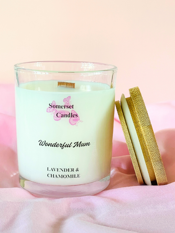 Candle with 'Wonderful Mum' and 'Lavender & Chamomile' text on a soft pink background